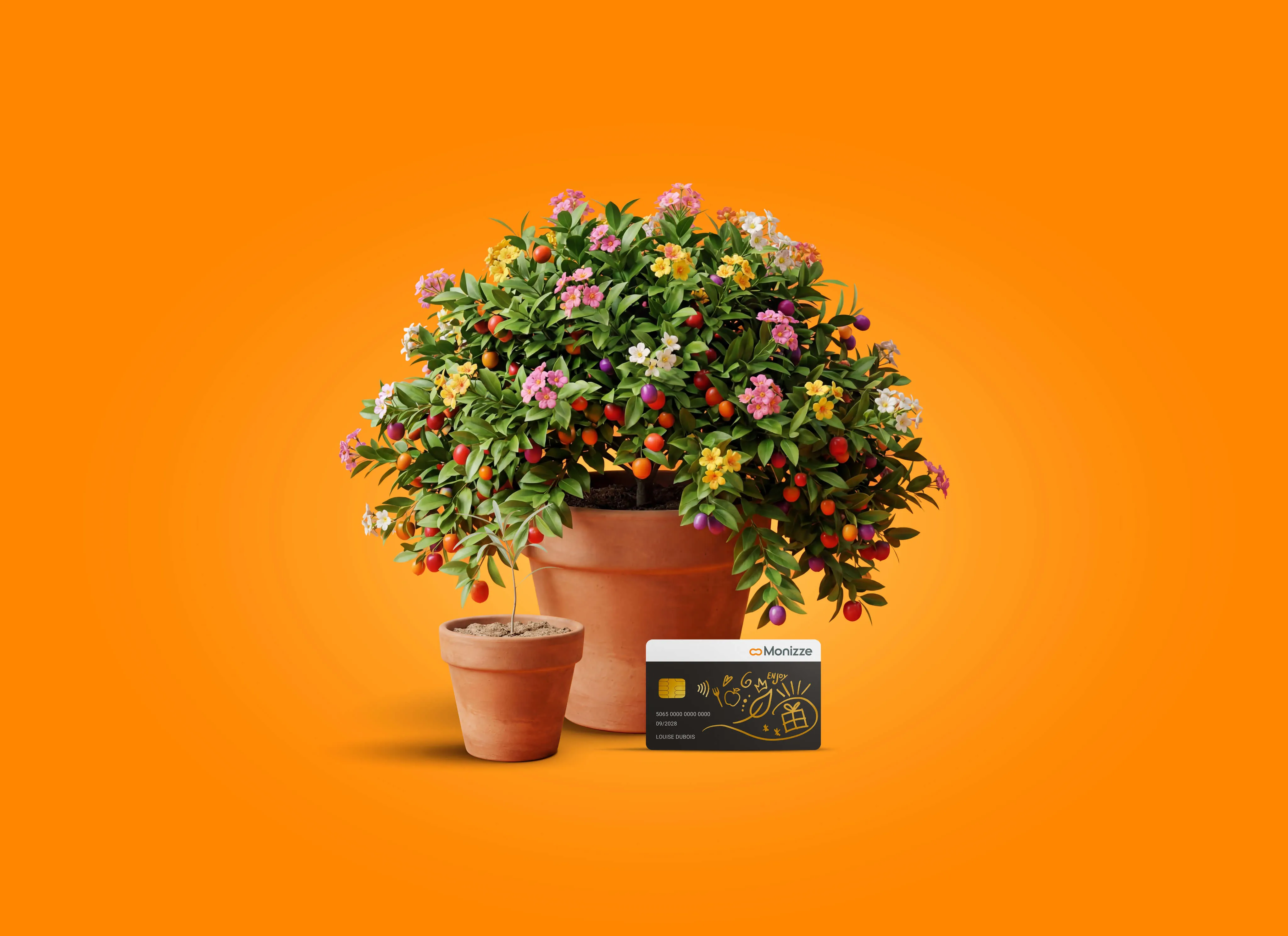 Couple de fermiers tenant des pommes dans un verger